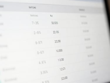 Close-up of a clean digital interface with financial metrics, bright daylight, soft professional shadows