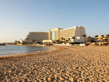Bright editorial photo of Steigenberger ALDAU Beach hotel beachfront and sandy coast in Hurghada.