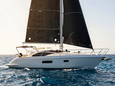 A sleek modern yacht sailing on the crystal clear waters of the Red Sea near Ain Sokhna, high contrast daylight, bright sun
