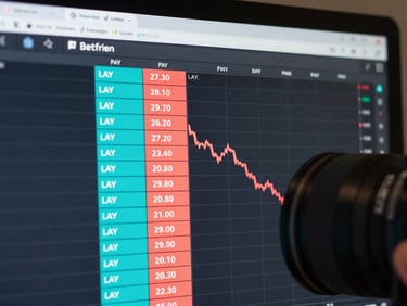 High-fidelity UI screenshot of a real-time Betfair Exchange ladder trading interface, showing cyan and coral back and lay columns with active order depth.