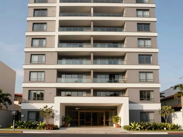 Modern apartment building facade in Mogi das Cruzes during daylight, contemporary architecture with clean lines, blue sky, landscaped entrance.