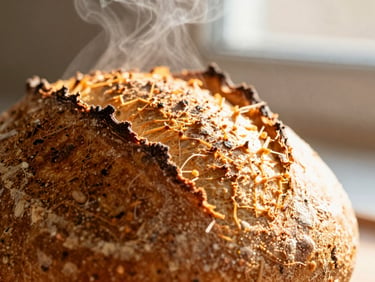 Macro close-up of a golden-brown sourdough crust texture, steam rising slightly, warm morning side-lighting, shallow depth of field