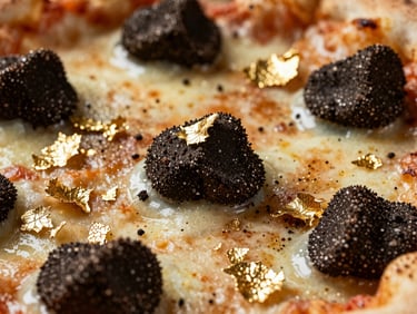 Extreme macro close-up of a pizza slice adorned with delicate gold leaf flakes and shaved black truffles, dramatic lighting.