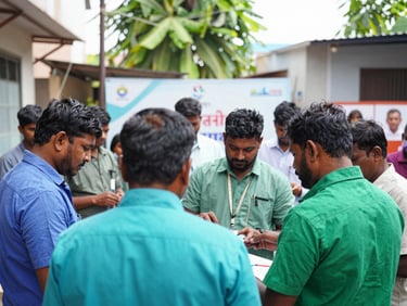 WE YSRCP volunteers setting up a public health awareness camp in a Guntur neighborhood, people gathering, bright natural daylight, clean green accents, sharp focus, 35mm lens