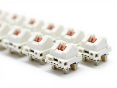 Macro shot of a mechanical keyboard switch, high-key studio lighting, crisp focus