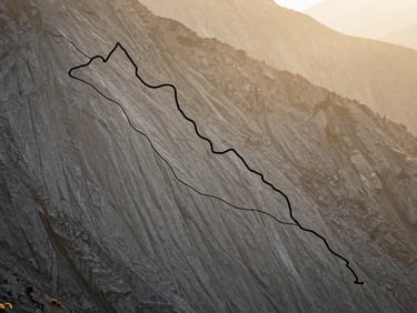 High-contrast graphic altitude map of the Langtang valley trail, minimalist lines on textured stone-gray background.