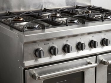 industrial heavy-duty gas range, brushed stainless steel, commercial kitchen, technical product photography, 50mm