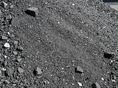 Close-up texture of crushed industrial minerals and raw gray silica sand under dramatic daylight, sharp focus, 35mm