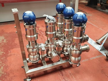 Bardiani stainless steel sanitary mixproof valves manifold for industrial food processing.