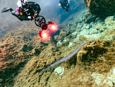 technical divers exploring underwater vallies in Malta