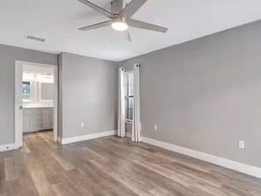 kingston home bedroom with new grey paint on the walls and new flooring