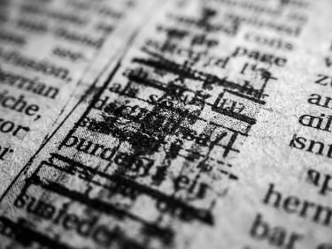 Crisp black and white macro shot of printed newspaper columns, deep shadows, sharp focus, editorial photography, 50mm lens