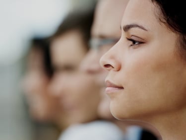 Profile of serious female student in the classroom.