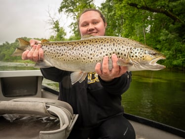 Kayla caught a new personal best while on.a guided trip with the South Holston Angler.