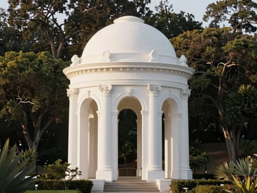 Elegant white architectural monument in San Diego Hills, surrounded by lush green trees and soft golden light