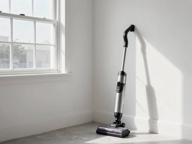 Bright Florida sunlight streaming through a window onto a clean, newly painted white wall with perfectly mitered baseboards, a professional vacuum standing neatly in the corner, clean work environment.