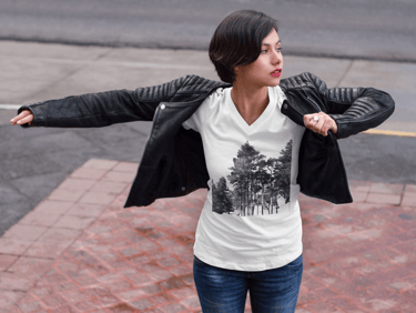 a woman in a white shirt and black jacket