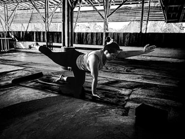 A woman practicing a yoga pose