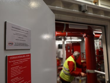 a man in a yellow vest and safety vest