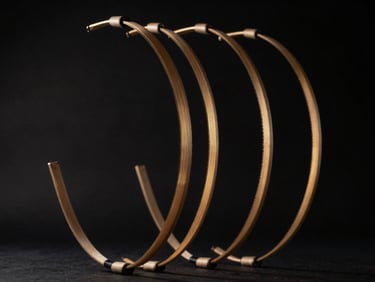 Motion-blurred arcs of nunchaku chains, high-contrast athletic photography, low-key lighting