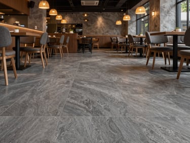 Wide-angle interior of a contemporary restaurant in Petaling Jaya, showcasing elegant grey stone-look SPC flooring under warm pendant lighting.
