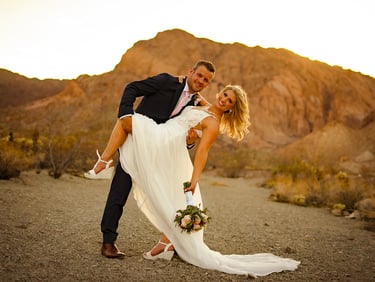 a man and woman are posing for a picture