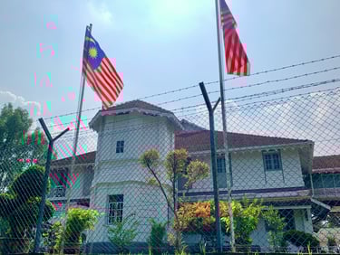 taiping heritage trail district officer residence building malaysia flag