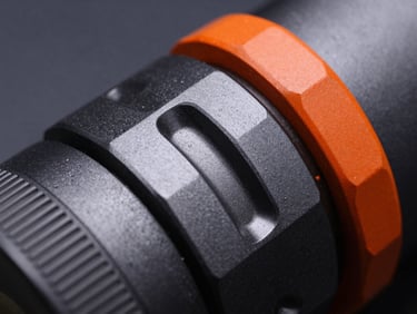 Macro lens detail of a heavy-duty metallic instrument with precise geometric element combinations, high-contrast studio lighting, deep slate background