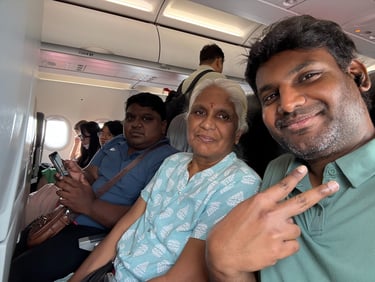a man and woman sitting on a plane