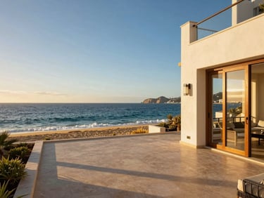 Luxury oceanfront villa in Palmilla Cabo, sun-drenched terrace, golden-hour warmth, rich ocean blue background