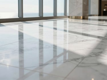 Extreme close-up of a perfectly polished white marble floor in a luxury hotel lobby, reflecting sharp geometric lines of floor-to-ceiling windows, bright coastal sunlight casting specular highlights, pristine and dust-free.