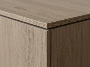 Extreme close-up macro shot of a perfectly flush edge-banded oak veneer panel, soft natural workshop side-light highlighting the seamless joint, architectural precision