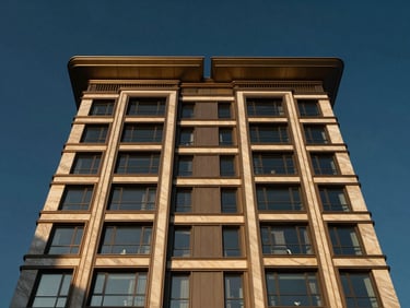 Symmetrical architectural shot of a modern luxury estate facade with sharp lines, warm golden-hour light reflecting on glass and marble, deep navy sky background.