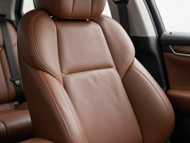 Close-up of clean, restored premium leather upholstery in a modern vehicle interior