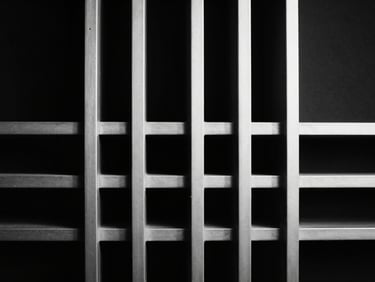 Minimalist high-end hardware, sleek metallic lines, dark background, sharp highlights, black and white