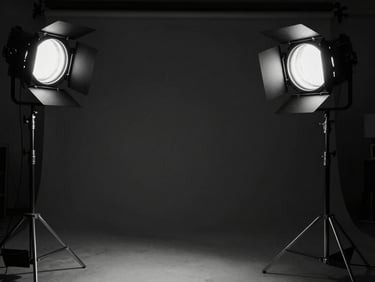 Cinematic behind-the-scenes video production set, dramatic studio key lights, deep shadows, black and white