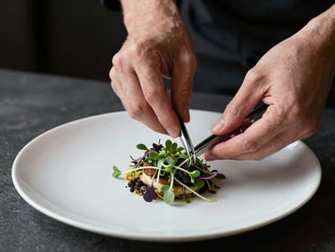Hands of a chef carefully adjusting a microgreen garnish on an artisanal plate using tweezers, dark textured background, soft natural side lighting