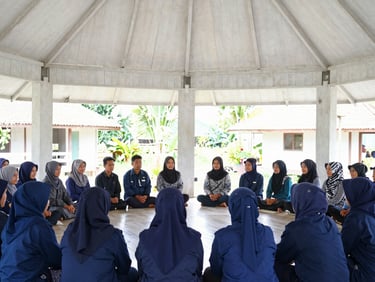candid editorial photography, community meeting inside a bright wooden village hall in Indonesia, natural daylight
