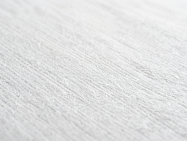 Macro close-up of micro-fiber paper texture, showing intricate weave, under bright clinical light, cool white tones.