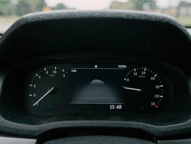 Moody editorial photography, close-up of a digital dashboard showing upward trends on a screen, natural overcast daylight, high-contrast desaturated tones with deep green accents, 35mm film