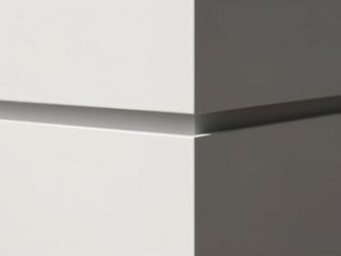 Abstract composition of a minimalist white tech device, geometric forms, dramatic shadows, monochrome.