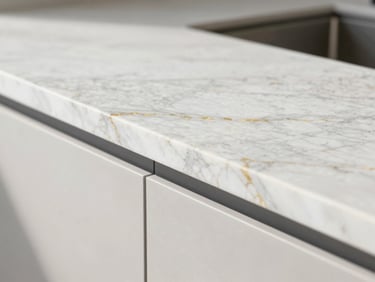 Detailed close-up of a premium quartzite countertop edge with subtle gold veining, soft natural light, 35mm