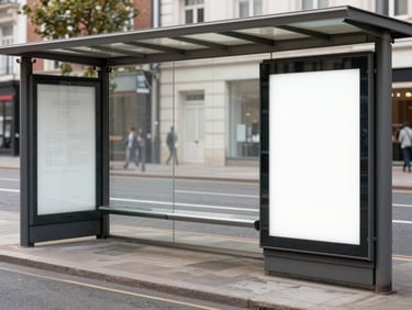 Full-frame view of an outdoor advertising campaign — a series of bus-shelter posters in a city street, clean campaign creative sharply rendered, natural daylight, no people in foreground