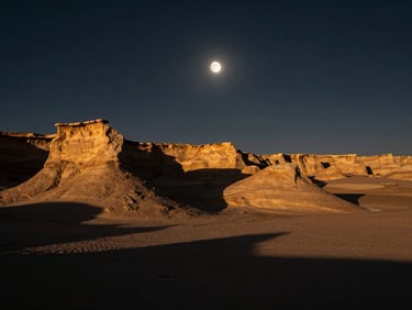 Dramatic geological formations in a remote desert at golden hour, long shadows, fine art landscape photography, deep contrast