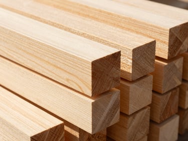 Close-up of neatly stacked structural timber beams, warm natural daylight, sharp focus, clean architectural framing, 35mm