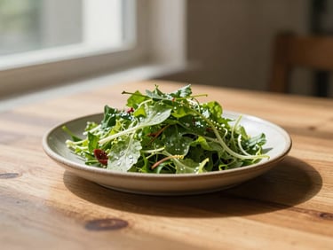 A vibrant seasonal green salad served on a rustic ceramic plate on a sunlit wooden table, shallow depth of field, 35mm