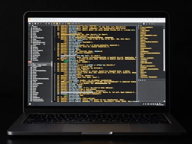 Matte black laptop displaying an encrypted data transfer interface with silver and gold lines, low-key studio lighting, 85mm