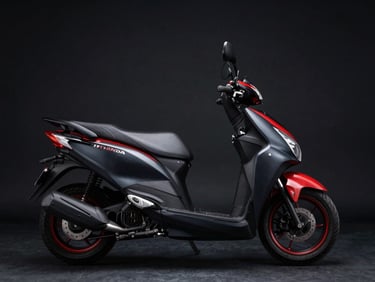 Studio shot of Honda Biz 125, profile view, clean dark background, 85mm