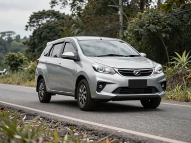 Wide shot of a Perodua Ativa navigating a slightly rugged road near Ranau, showcasing its ground clearance.