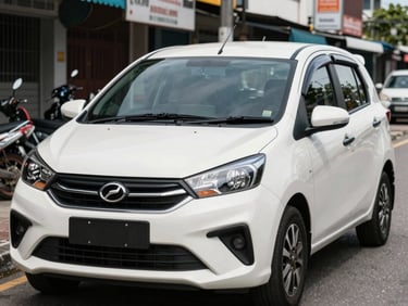 Close-up environmental shot of a Perodua Axia parked in a lively Kota Kinabalu neighborhood, bright daylight.